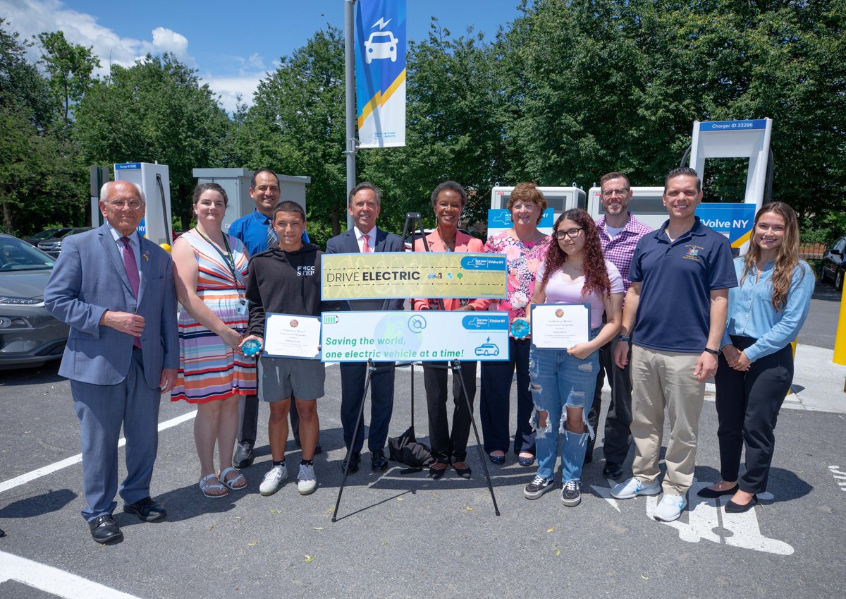 NYPAenergy's tweet photo. Two Amsterdam High School students were recognized today for their winning designs in the "DRIve #EV Downtown" bumper sticker contest designed to promote #electricvehicle driving and highlight the need to reduce our carbon footprint in #NYS. 

Read more: https://t.co/3SZ2EDJrbw https://t.co/IfqztEmJbD