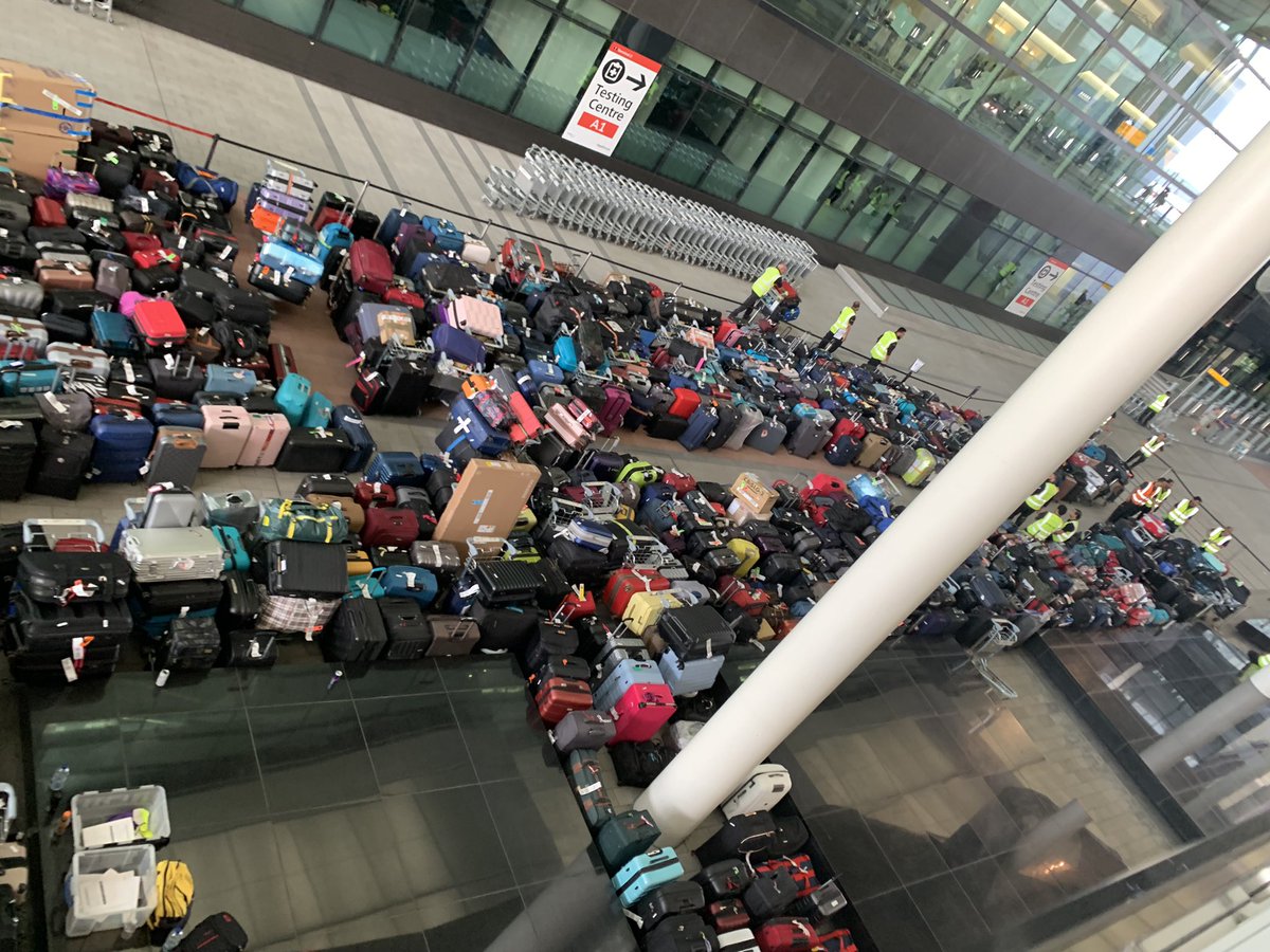StuDempster's tweet photo. Lost luggage has a final resting place perhaps….@HeathrowAirport T2…mine’s the black one (I think) https://t.co/u0tDMTgFHj