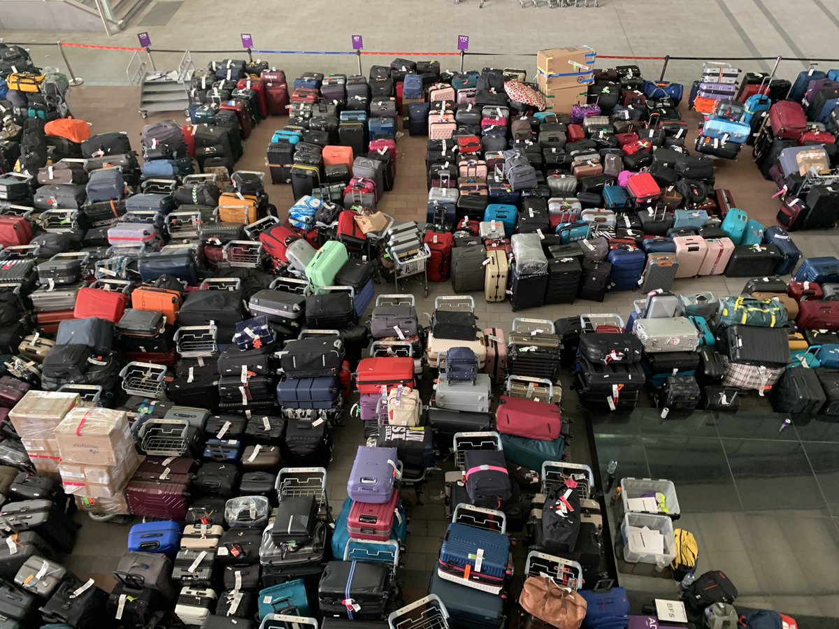StuDempster's tweet photo. Lost luggage has a final resting place perhaps….@HeathrowAirport T2…mine’s the black one (I think) https://t.co/u0tDMTgFHj