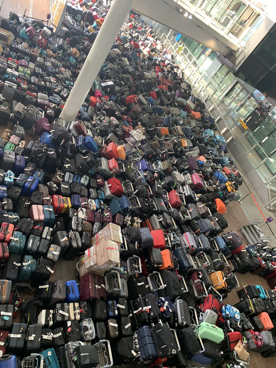 StuDempster's tweet photo. Lost luggage has a final resting place perhaps….@HeathrowAirport T2…mine’s the black one (I think) https://t.co/u0tDMTgFHj