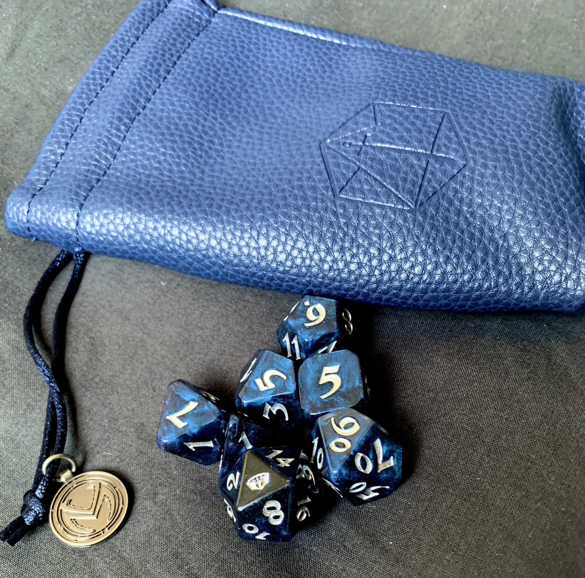 LadyEmathea's tweet photo. My first dice set ever and I’m in love! @CriticalRole https://t.co/6I9pDUEFil