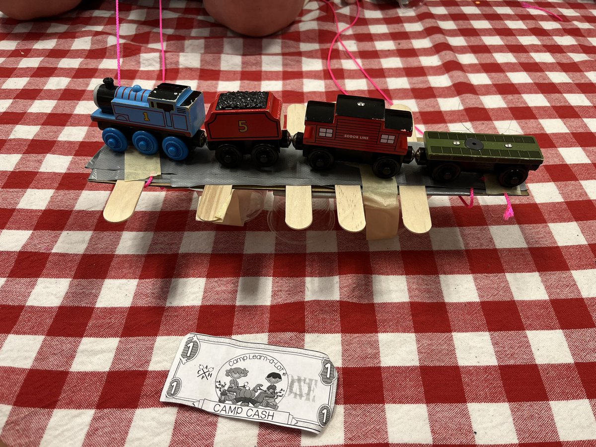 KimberlyMJ1995's tweet photo. We tested out our bridges today to go along with the story of Casey Jones. Everyone’s bridges were strong enough to hold the train. @RFe_RCS #rcssummerschool2022 https://t.co/pPeUifAO15