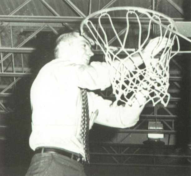 Coach Larry Moore cuts down the nets after the Laurel Bears 1971 win over Hartington Cedar Catholic in the Class B district final.