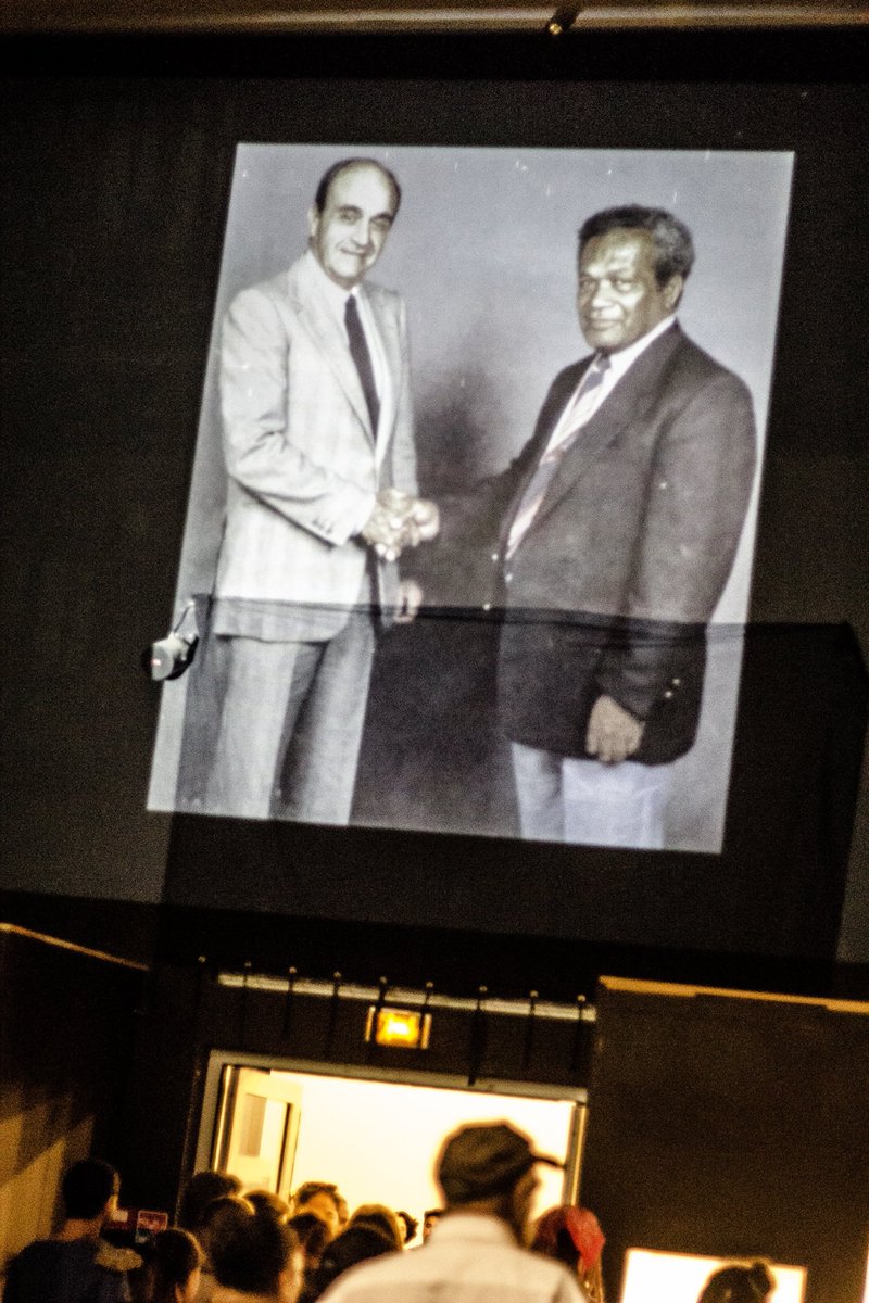 MuseedeNC's tweet photo. #LifeLessonsMW the museum had used the famous photograph of the "handshake" between Jean-Marie Tjibaou and Jacques Lafleur in 2016 during its Nights of the Museums show entitled "Flashback in our history" #newcaledonia #MuseumWeek #TeamNC https://t.co/2FgKjkOR3r