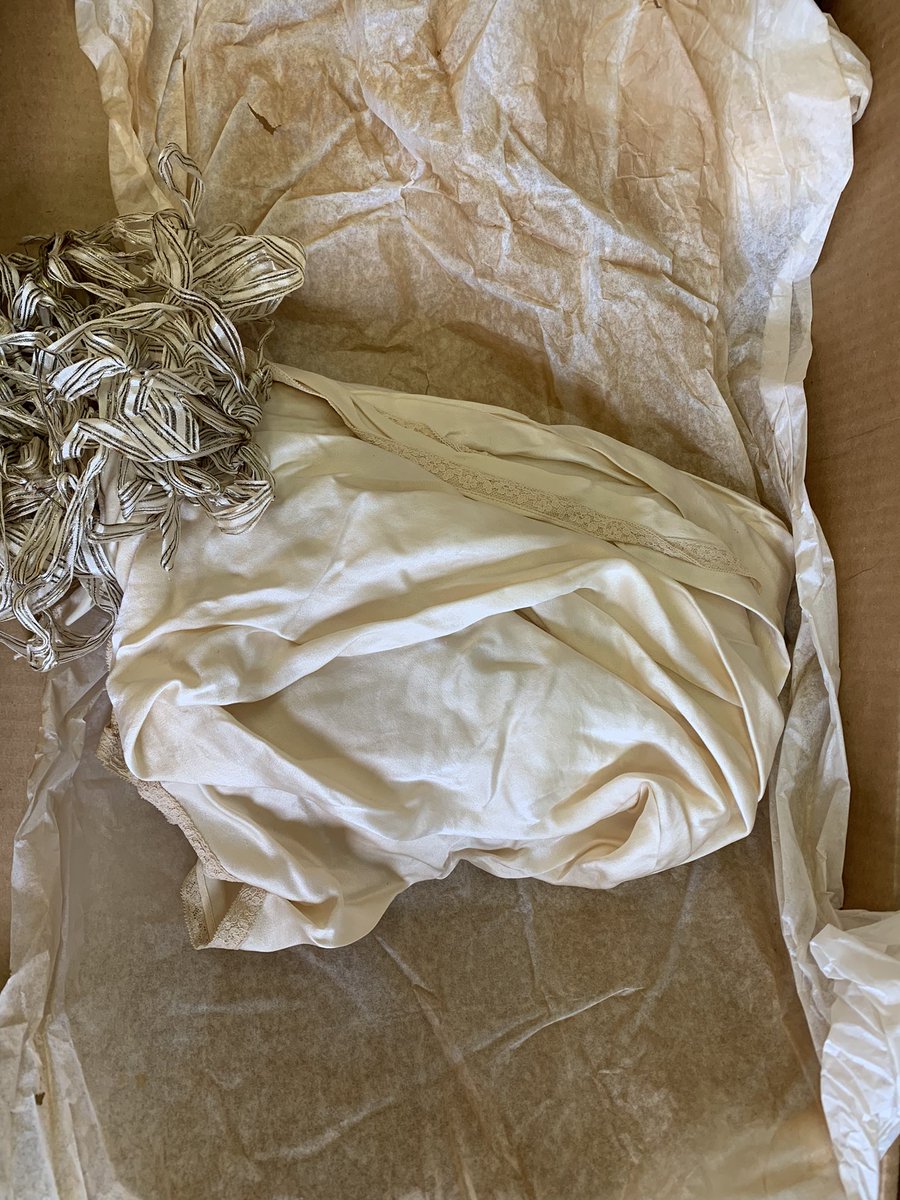 We were recently gifted with a beautiful 1920’s wedding dress, veil &amp; shoes. It had been stored in an ordinary cardboard box w/regular tissue paper. Once we’ve examined it, she will be properly stored for a future exhibit. This is what happens when you wrap silk in regular tissue
