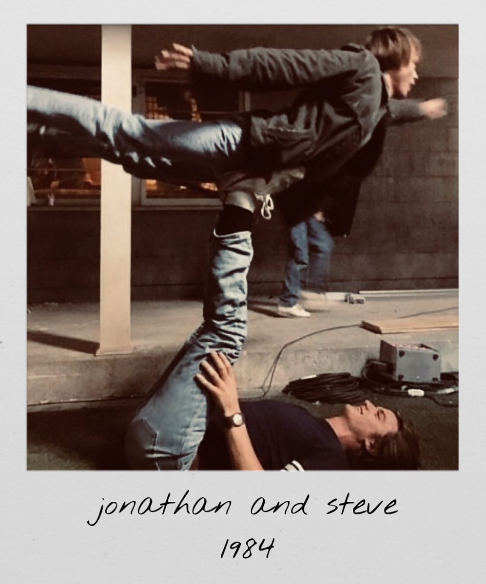 nancy takes a polaroid of jonathan and steve…getting along? 
1984