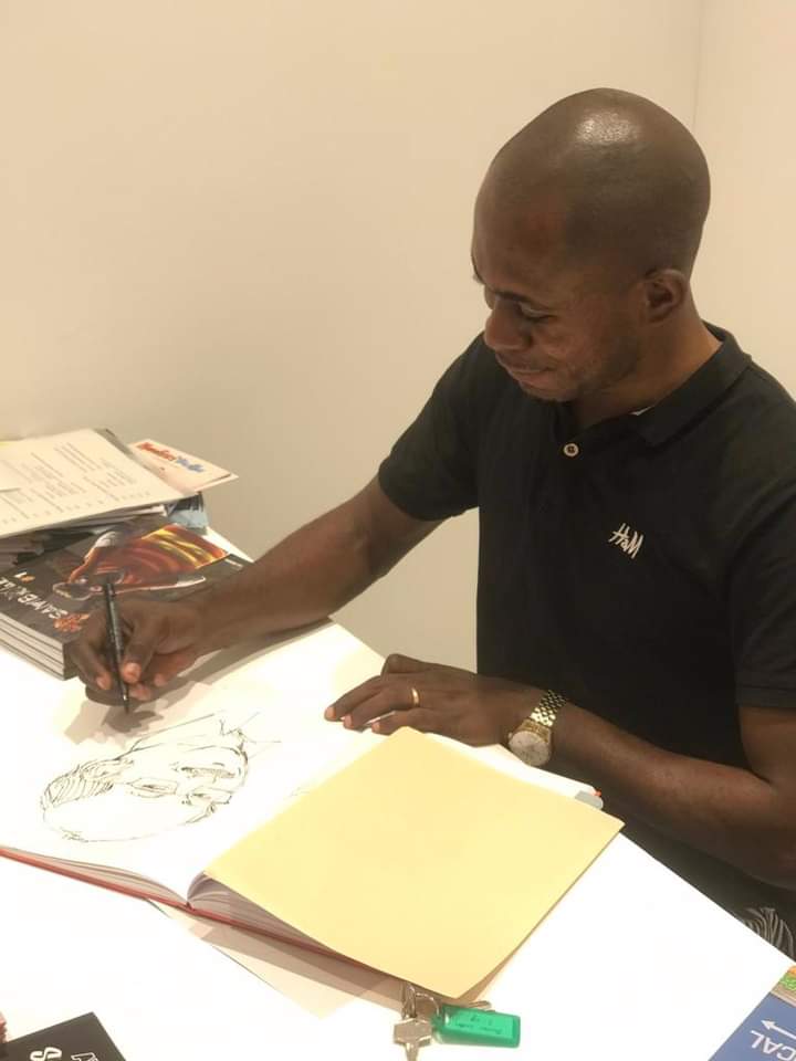 SunriseRdc's tweet photo. #Culture et Arts : l'illustrateur et bédeiste @YannKumbozi séjourne en Allemagne  où il expose au Comic BOK au  salon d’Erlangen dans le cadre du projet #popularimages  initié par le @Goethe-Institut #Kinshasa https://t.co/bjO7TrUhIk