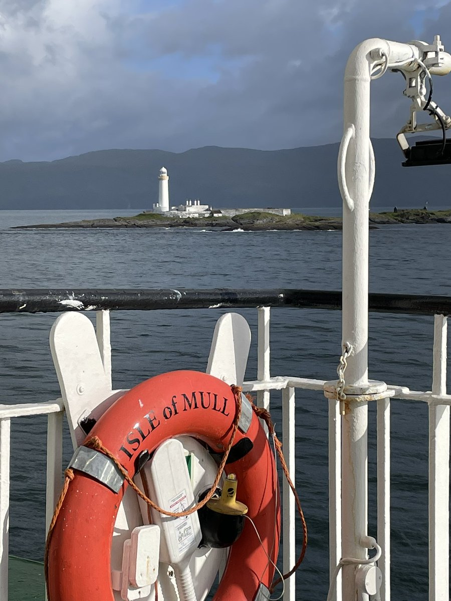 Dramatic skies to the north but blue skies to the south, Isle of Mull ferry
