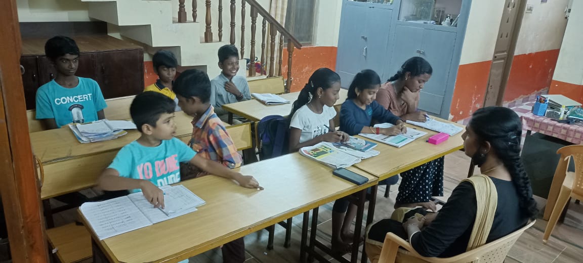 Ms. Silvia with the Rainbownagar evening school children.