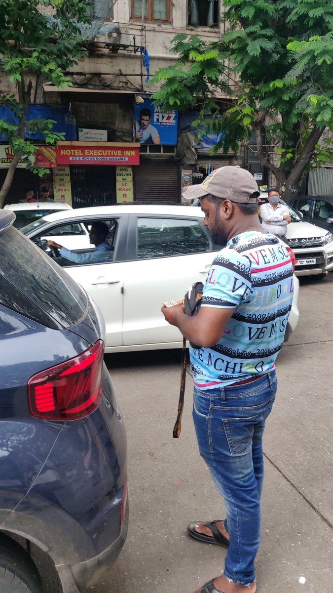 Nashawagh's tweet photo. @mybmc parking lot at Crawford market . Charging 150 per hour telling that private parking and using mcgm parking logo https://t.co/i8KEl27LEb