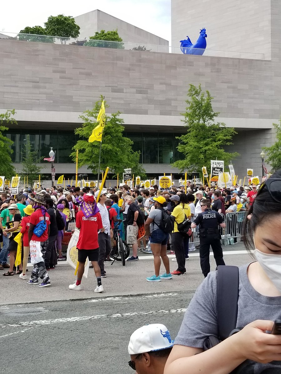 debbieweinstein's tweet photo. #MoralAssembly2022 crowd of #PoorPeoplesCampaign activists overseen benignly by giant blue chicken  #voice4humanneed https://t.co/jikouF43uz