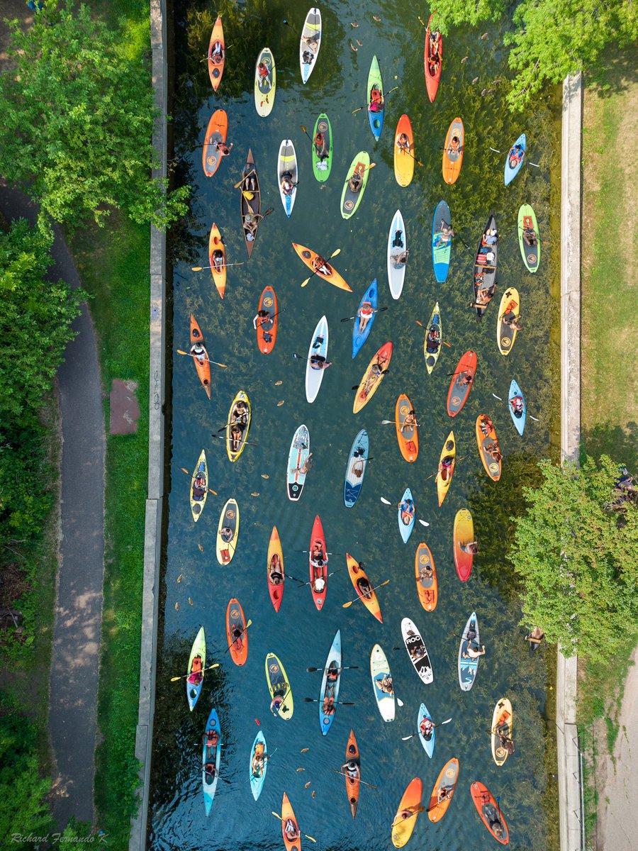 RichFernandoK's tweet photo. A time lapse of 30min of kayakers on the Lake of the Isles canal composited into a single frame https://t.co/yl4i5GRRgV