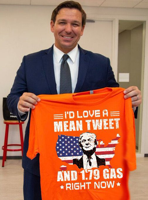 Fact Check-Altered photo of Florida Governor Ron DeSantis holding a Trump t- shirt | Reuters