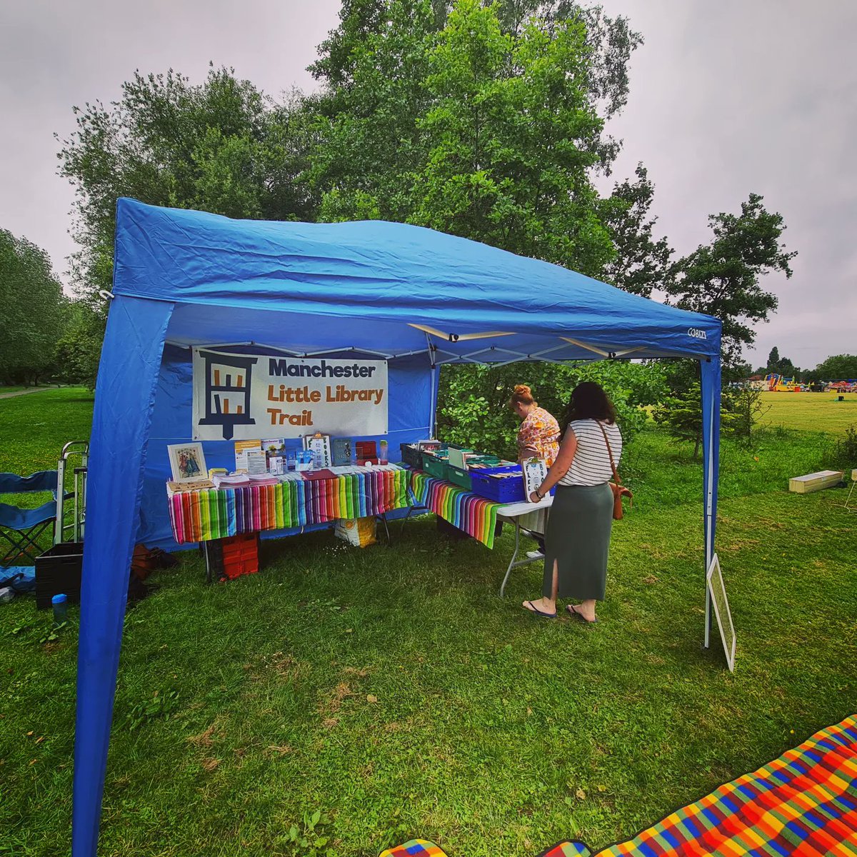 Southmanctrail's tweet photo. Today we popped up at @LadybarnFriends for their fun day  we had a great day and gave out 100s of books.  Our next pop up will be at @mauldethprimary Festival on 16th July 12-4. https://t.co/AYuzymoU6G