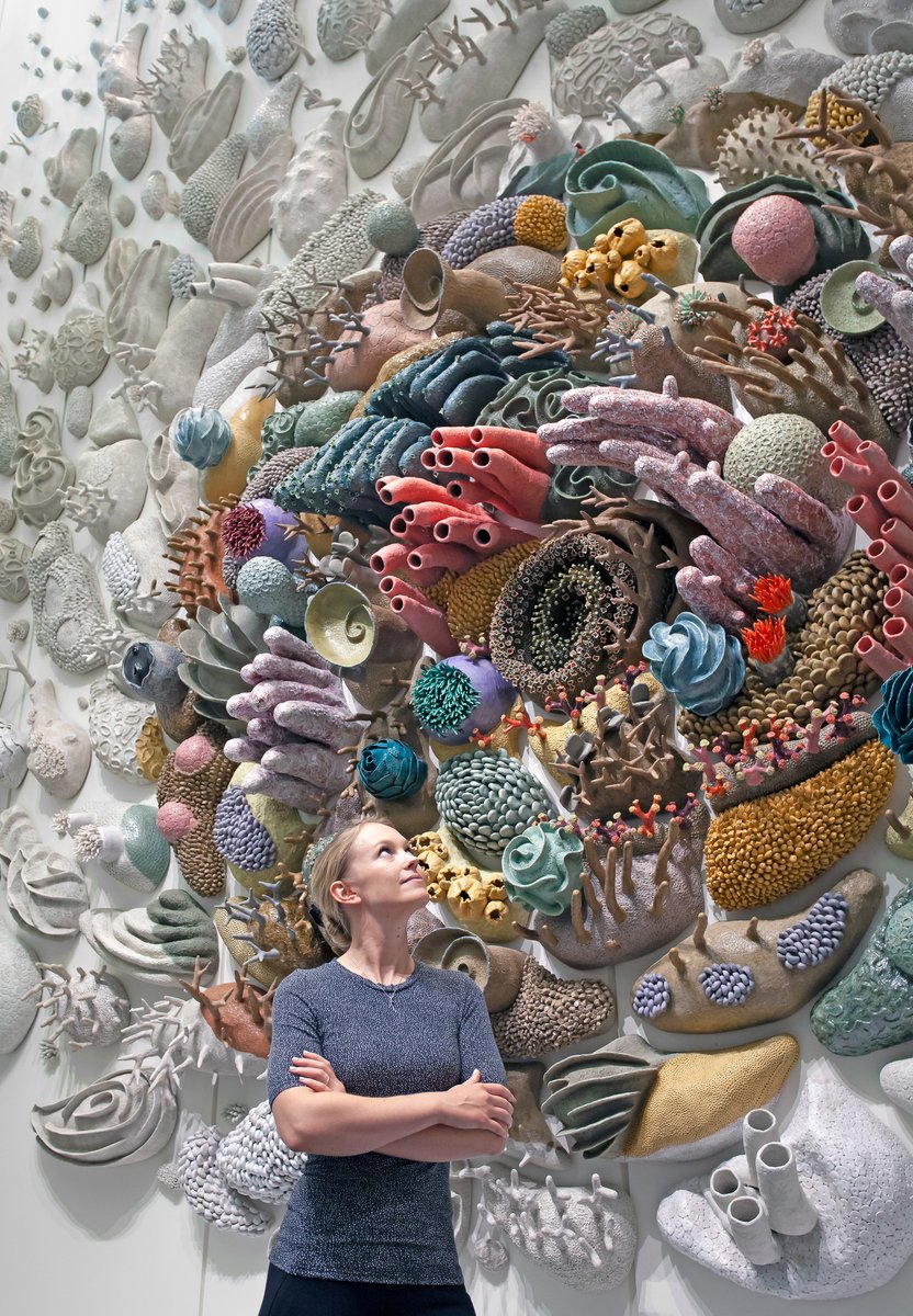 .<a href="/courtneycoral/">Courtney Mattison</a> explains the delicate balance of nature reflected in her ceramic installation: "Sea temperatures warmed by climate change stress corals,... causing these coral hosts to ‘bleach’ white and starve." bit.ly/3MSHYv3