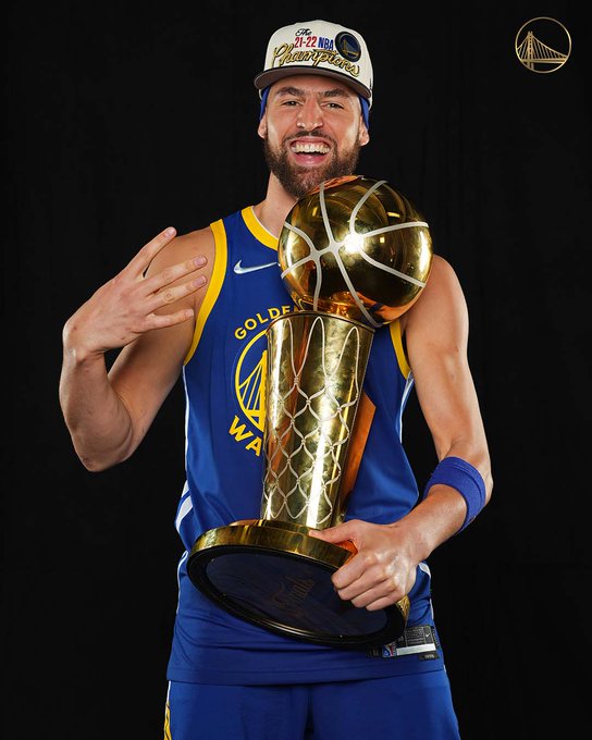 klay thompson holds trophy