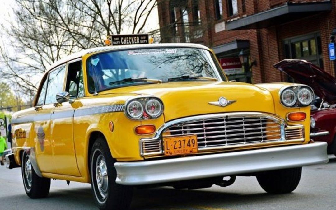 DrPnygard's tweet photo. Checker Taxi put its first cab on the street OTD in 1923. One could grab a ride in a #CheckerCab in many U.S. cities, but the vehicle is closely identified with #NYC. The boxy yellow cars became American cultural icons, featured in TV series like #Taxi, #TheSimpsons &amp; "Friends." https://t.co/h3V8RGZvZL