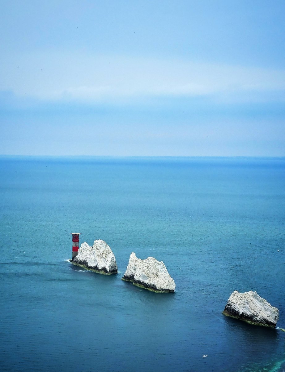 OneTeaTraveller's tweet photo. Fantastic view of Needles lighthouse from the view point! A day trip to Isle of wight is worth only because of this.We could've taken a slow boat ride around the light house too but the experience of a small trek/walk &amp; cherishing the view from the top gives you a different high! https://t.co/FVS6gMnyiA