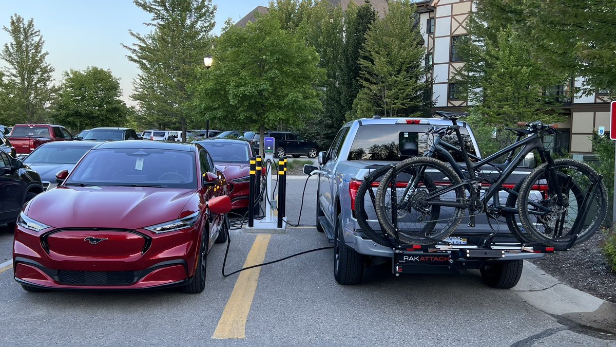 TheVirtualTim's tweet photo. Hey, look at all the @Ford EV’s.  Two @FordMustang Mach-E’s and an #F150Lightning   We love our MME, but we’d love to add a Lightning to our driveway! https://t.co/ZmIhL81Gil