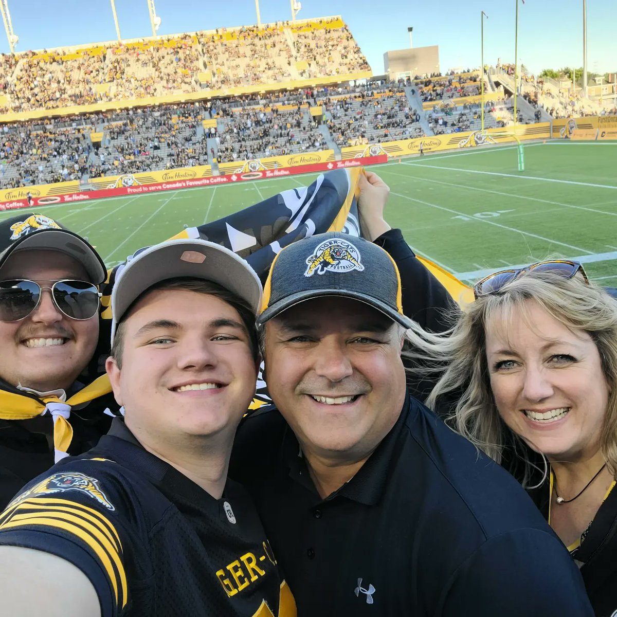 LynnRThom's tweet photo. Season home opener today in my home town, Hamilton!  
Too bad they lost in overtime,  still early in the season.
#fathersday #CFL #Hamilton #tigercatfootball #seasonhomeopener #familytime #fans #oskeeweewee https://t.co/8n2OQ3UWKU