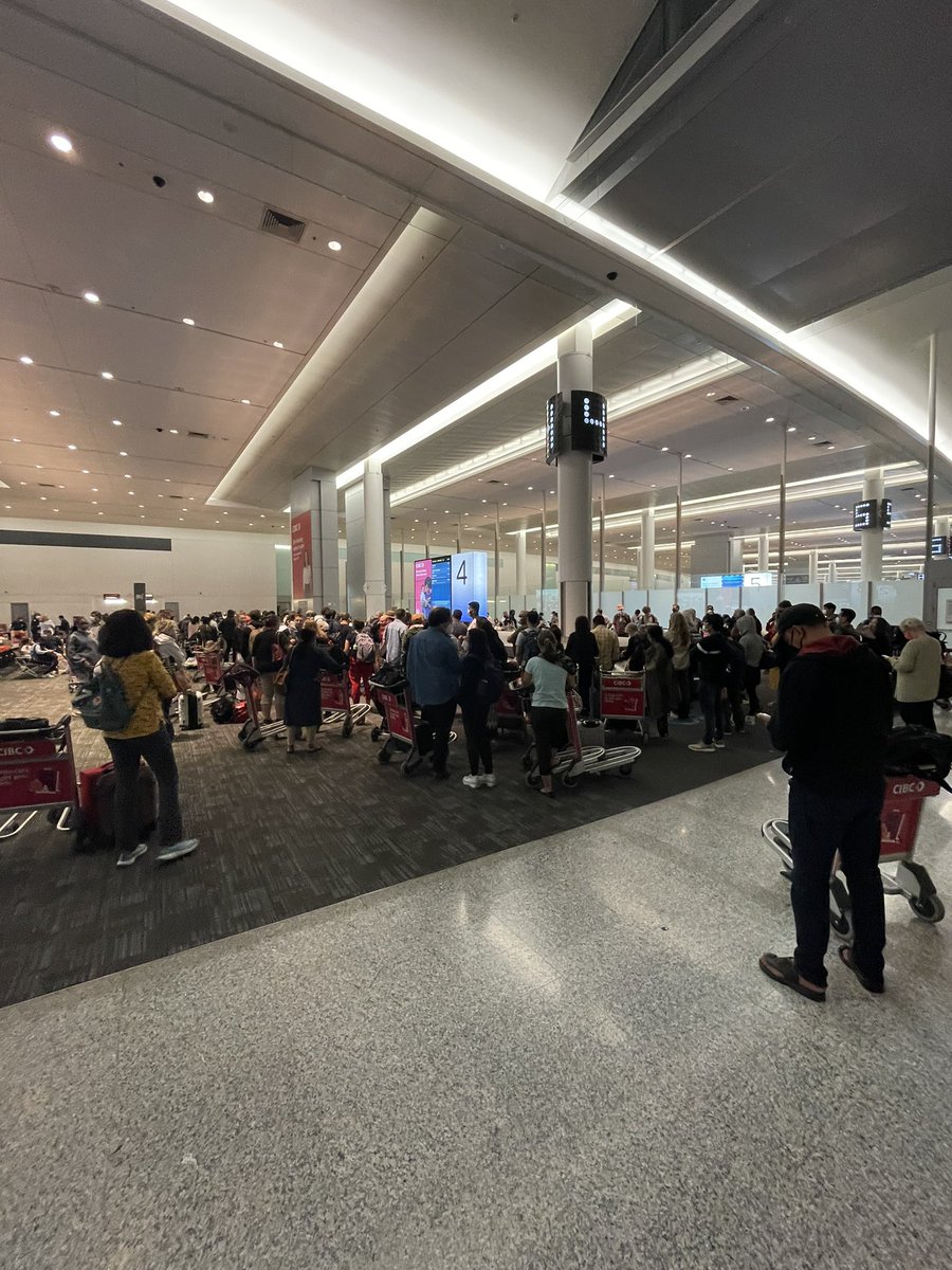 RodBlackTV's tweet photo. Google the word HELL and I’m sure a picture of #Pearsonairport pops up. @ryanwhitney6 you are bang on. Chaos Confusion Anger. From interminable flight delays to a luggage crap storm. Illogical &amp; preventable. Stop the insanity. Please. Who would want to fly thru this? https://t.co/amD6iLz6Jg