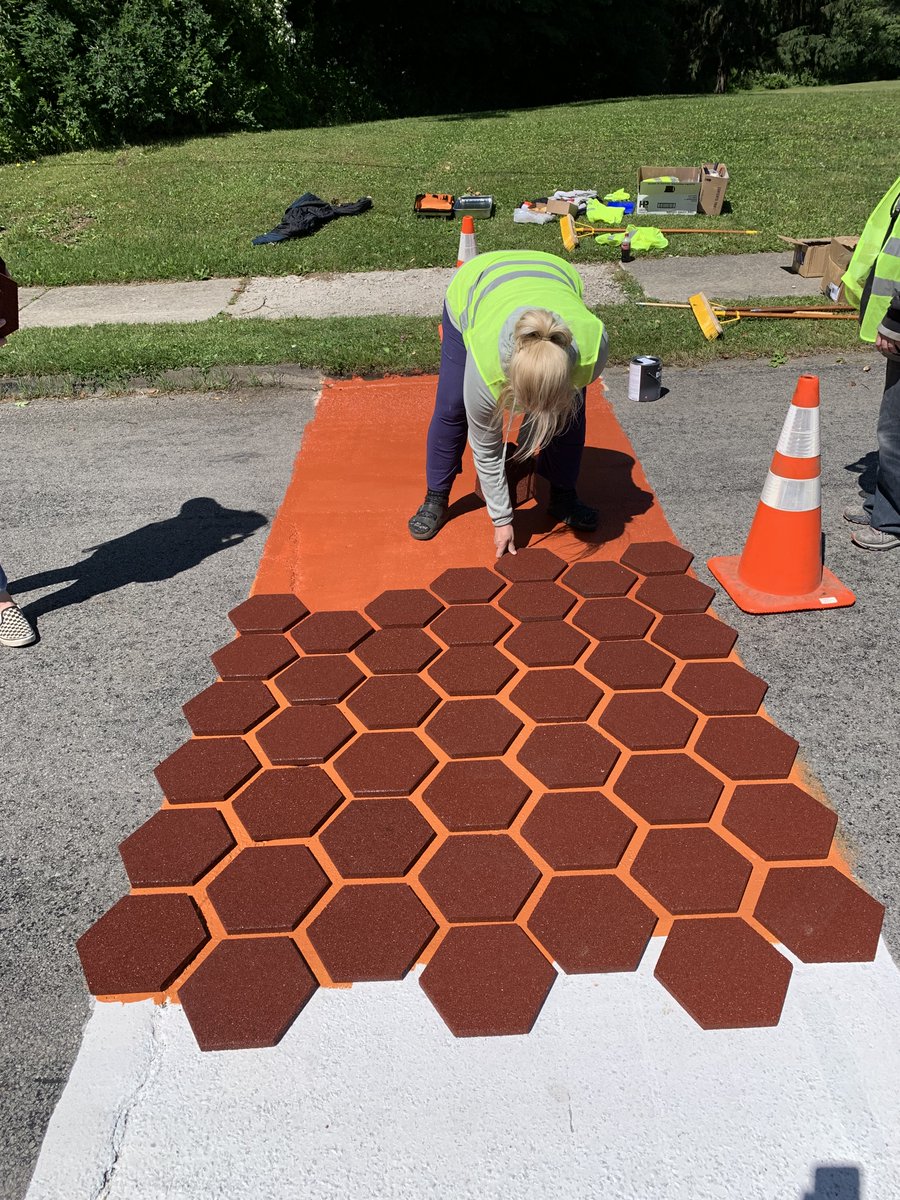 ImpactCorry's tweet photo. Our volunteers have been busy bees 🐝 painting a honeycomb crosswalk on Mead Avenue! Thank you to all of our volunteers, this work would not be possible without you! Interested in helping us? Contact Impact Corry to get involved today! #ImpactCorry #CorryPA #RemakingRural https://t.co/slabLY59fS