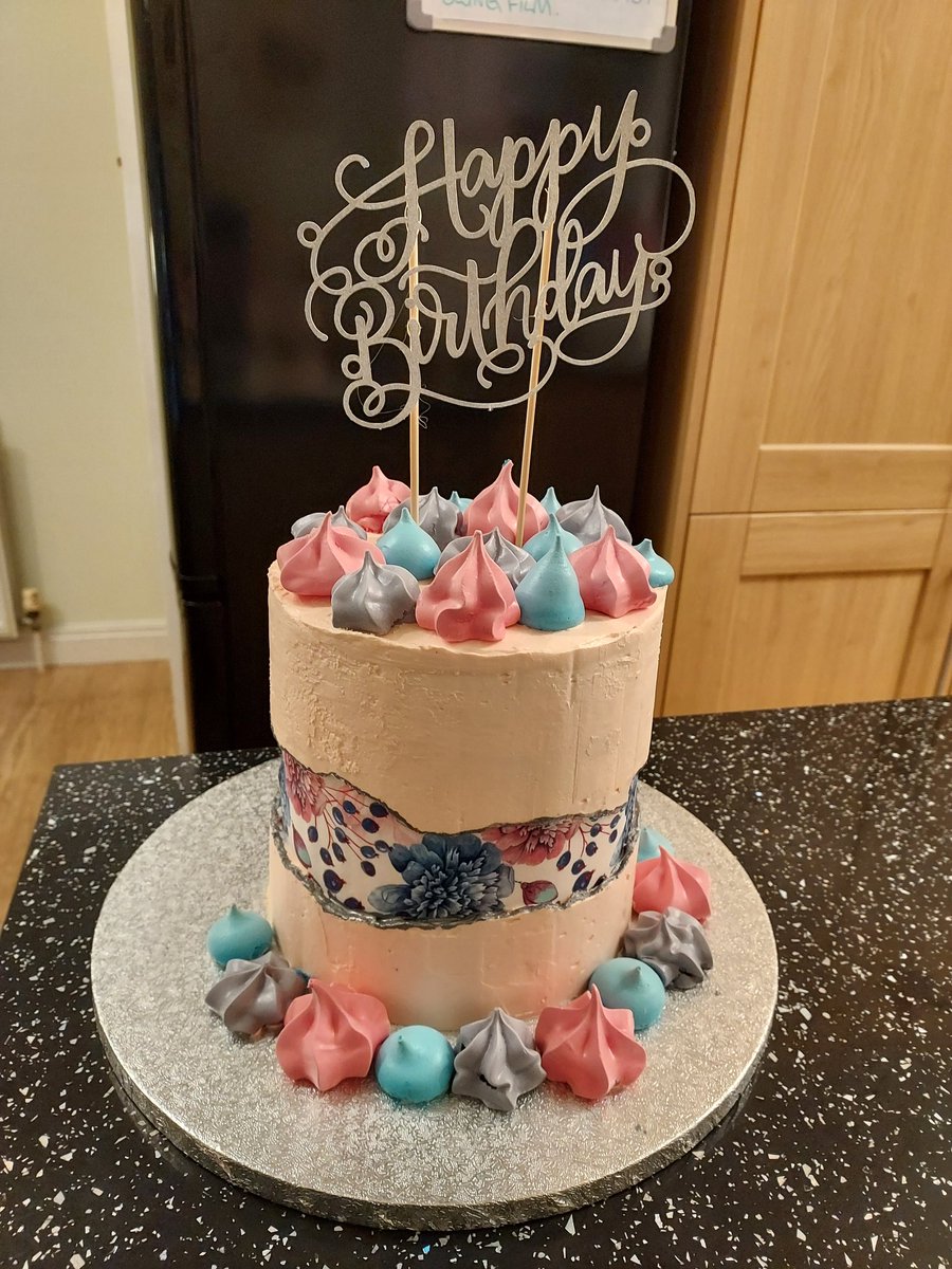 Vanilla sponge, swiss meringue buttercream, meringue decorations &amp; me made birthday topper.