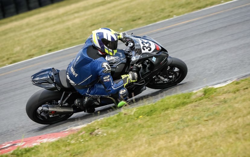 Andy getting the bike over. Not too shabby for a paralysed rider. <a href="/SnettertonMSV/">Snetterton Circuit</a> <a href="/BMWMotorradUK/">BMW Motorrad UK</a>