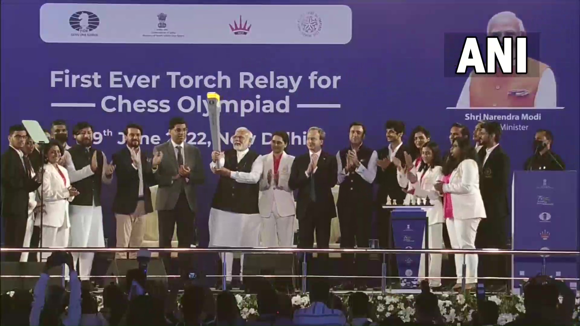 Yogi hands over Chess Olympiad torch to Viswanathan Anand