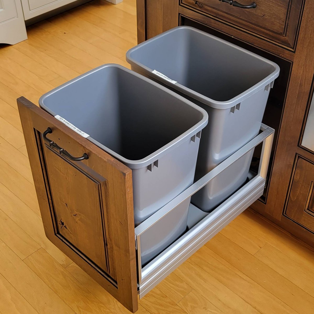 One of our most popular cabinet accessories is the double wastebasket pullout.  We design almost every kitchen with one!  

What accessory do you want in your new dream kitchen? 

#cabinetaccessories #wastebasketpullout #trashpullout #shilohcabinetry #function #recycling