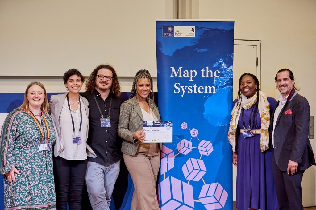 We're delighted to announce the 2022 #MaptheSystem winner! A big congratulations to the Finclusive Team (from <a href="/UCT_news/">UCT</a> &amp; <a href="/BerthaCentre/">Bertha Centre</a>), made up of Makha Baloyi, Lauren Fray, &amp; Janine Rutsch! 🏆