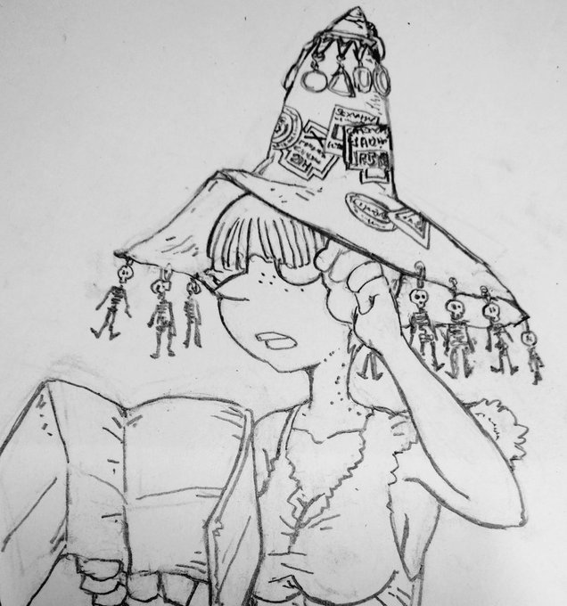 帽子には各地の魔導審査証とご当地メダルキーホルダー、そして鈴なりのガイコツキーホルダー 