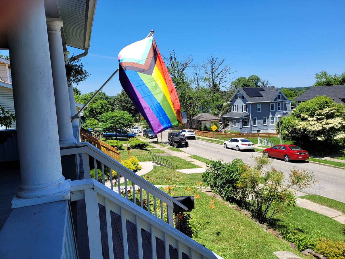 JenBC_'s tweet image. Enjoy celebrating Father's Day and Juneteenth today in ways that bring you joy. Beautiful weather on our porch with the Progress Pride Flag my father in law hung for us this week for our family! #FathersDay2022 #juneteenth2022