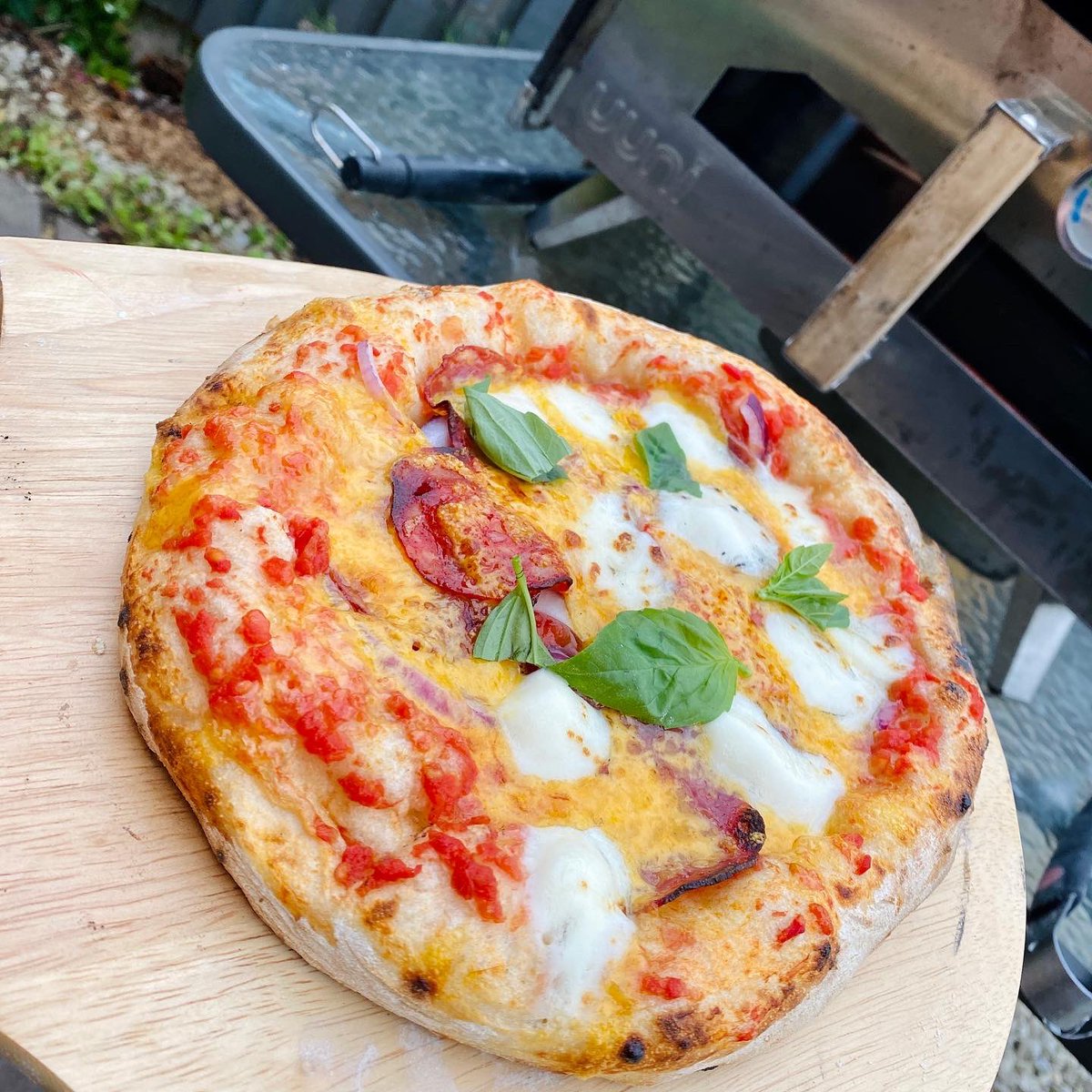 Mrs home from holidays and requested pizza. 24 hour dough. Wood fired in the Ooni, my best yet. Happy!