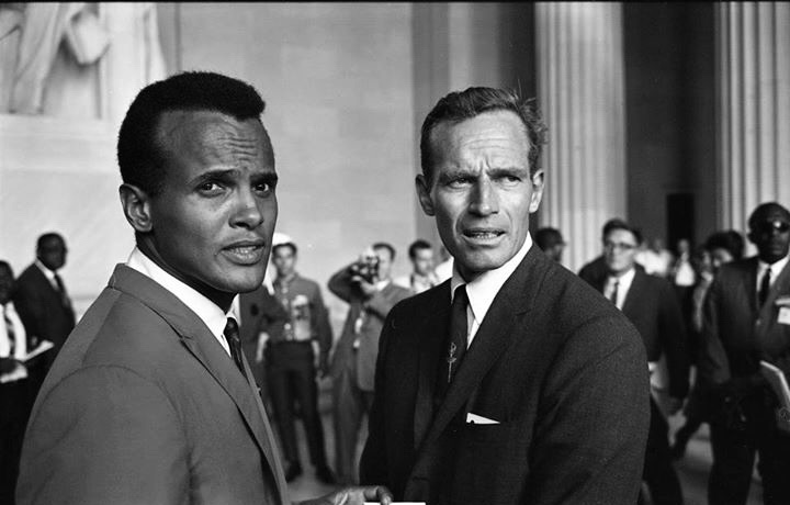 Harry Belafonte and Charlton Heston at the March on Washington in 1963.