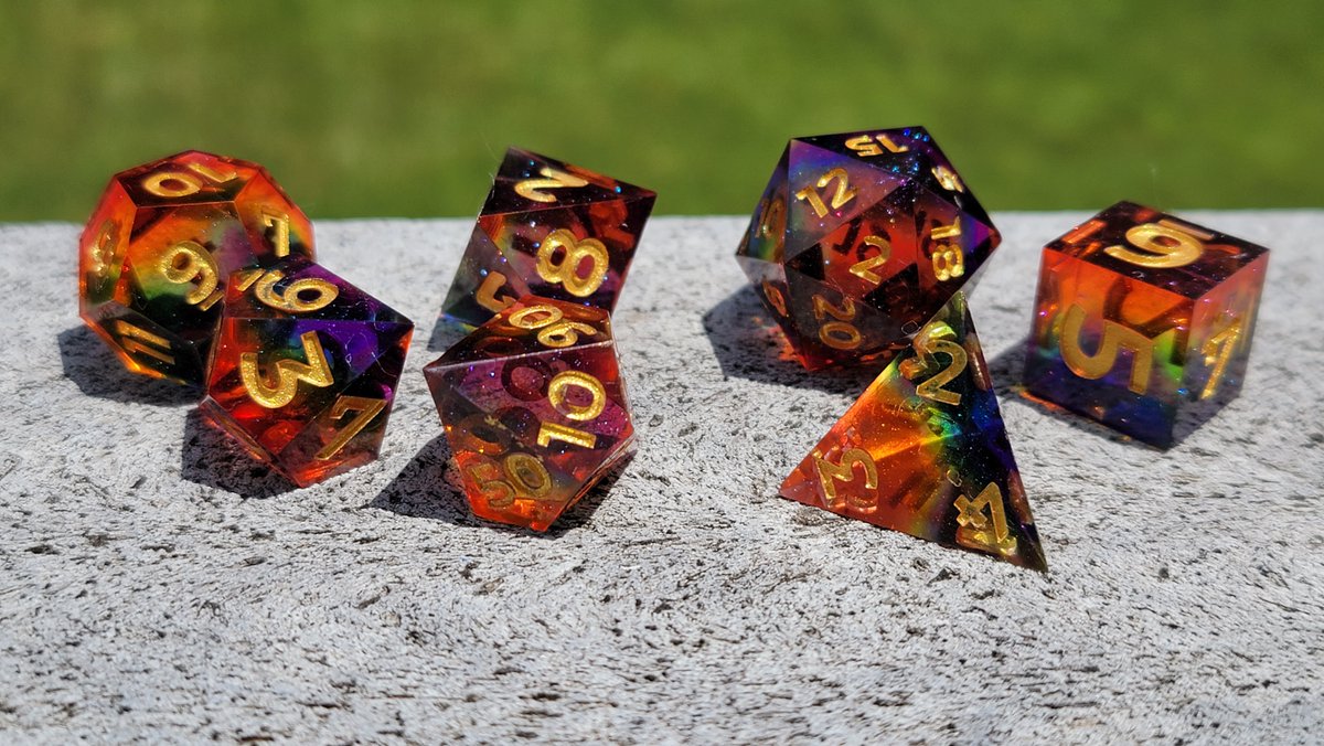 fancywings_'s tweet photo. I still have some sets left from my FFXIV-themed dice! the floral ones have translucent ink that glows in the dark :D

#dice #handmadedice https://t.co/KmjfnEmhv3
