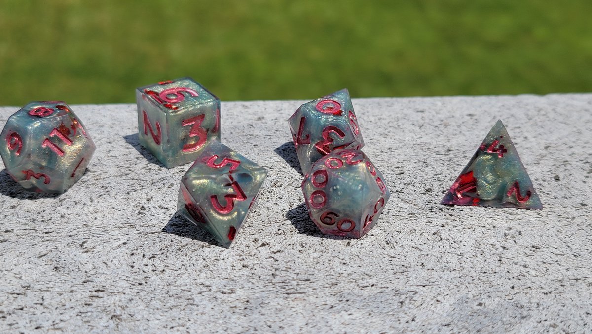 fancywings_'s tweet photo. I still have some sets left from my FFXIV-themed dice! the floral ones have translucent ink that glows in the dark :D

#dice #handmadedice https://t.co/KmjfnEmhv3