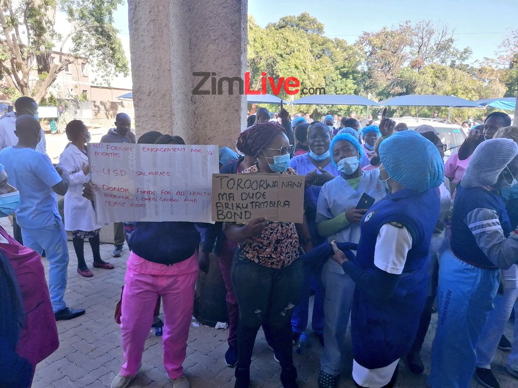 #HappeningNow Nurses and senior doctors are on strike over pay across Zimbabwe. These are the scenes at the country's biggest public hospital, Parirenyatwa. Anti-riot police have just arrived