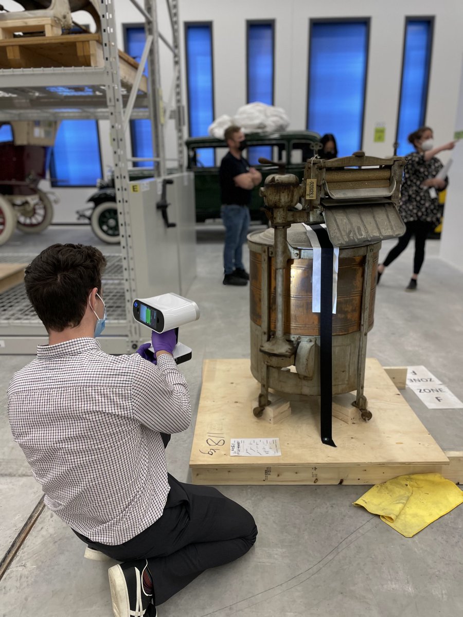 L_DiVito's tweet photo. Carleton co-op students, Max and Emily, testing out the capabilities of the Ingenium Digital Innovation Lab's new #3D scanners while behind the scenes in the #artifact storage at the Ingenium Centre! 
Artifacts: washing machine, and early electric vehicle from the 70s. 
#museum https://t.co/VGjN7mQXk1