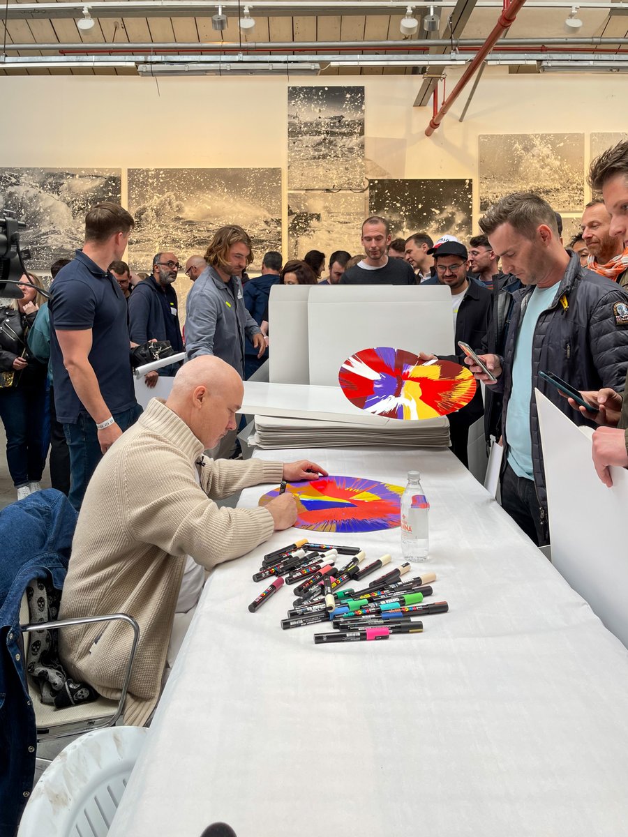 HENI's tweet photo. The Currency #NFT holders got a chance to visit 
@hirst_official's studio earlier this month. 🎨🧑‍🎨🖼️

Here are a few snaps from the day 📸

Check out 
@hirst_official's The Currency Collection here 👉 https://t.co/F9bzS1KeFY 

#HENI #thecurrency #NFTCommunity https://t.co/6UyuigWtu6