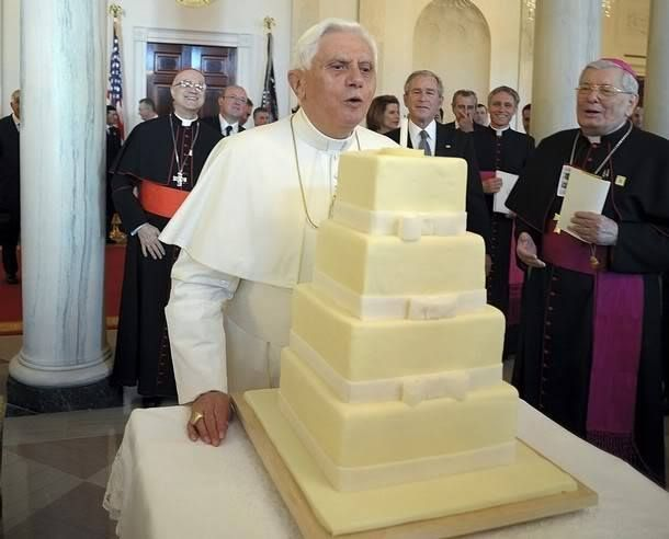 US President George W. Bush presents Benedict XVI a birthday cake at the White House, shortly after the crowds outside sang him "Happy Birthday" (2008)