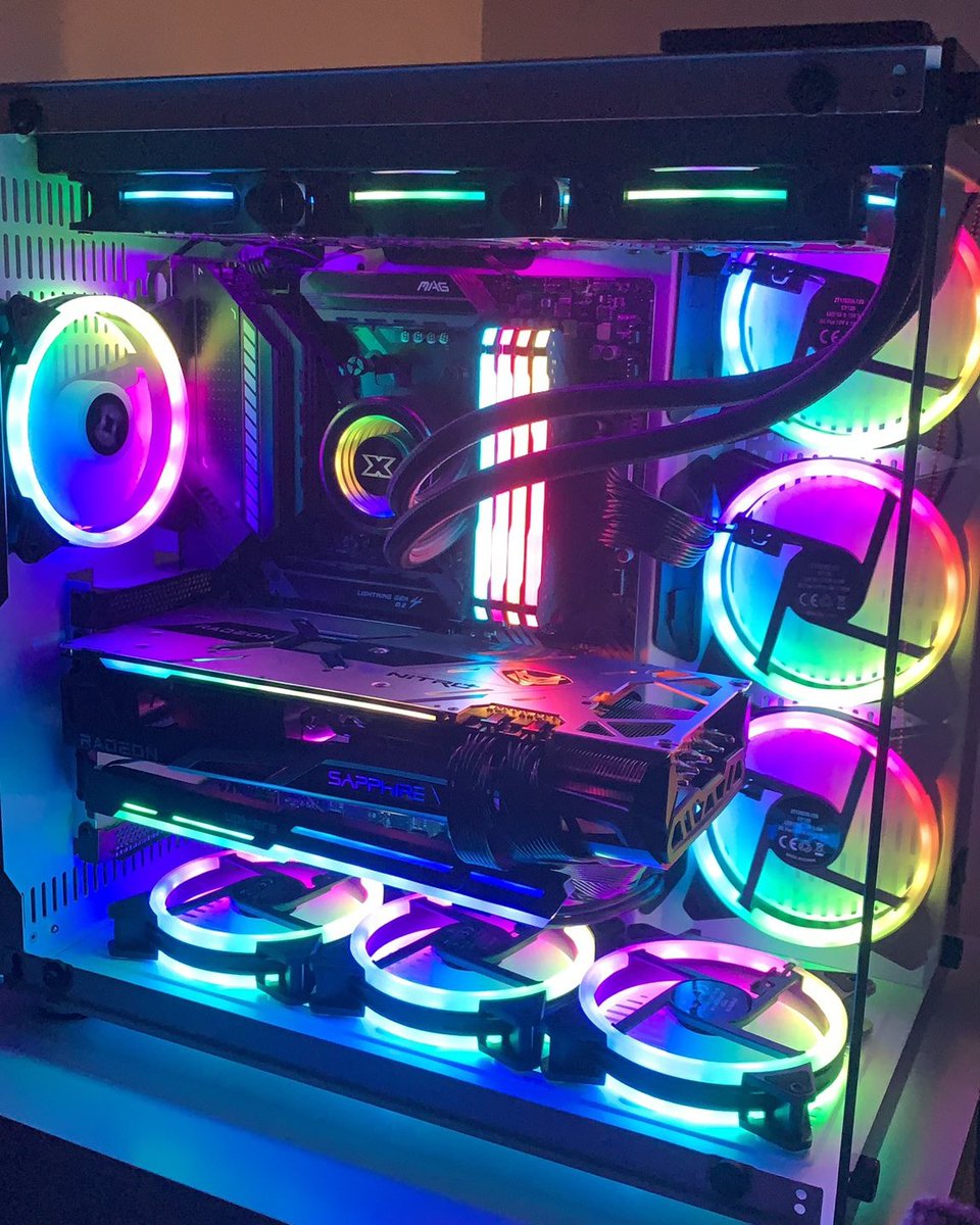 SapphireTech's tweet photo. ARGB Heaven by @AndyLclr with the SAPPHIRE NITRO+ AMD Radeon RX 6900 XT🌈
.
.
#SAPPHIRE #NITRO #RX6900XT #gamingsetup #battlestation #graphicscard #GPU #SAPPHIREnation #SAPPHIRETech #AMD #Radeon #hardware #gamingcommunity https://t.co/vPnJwQ13fX