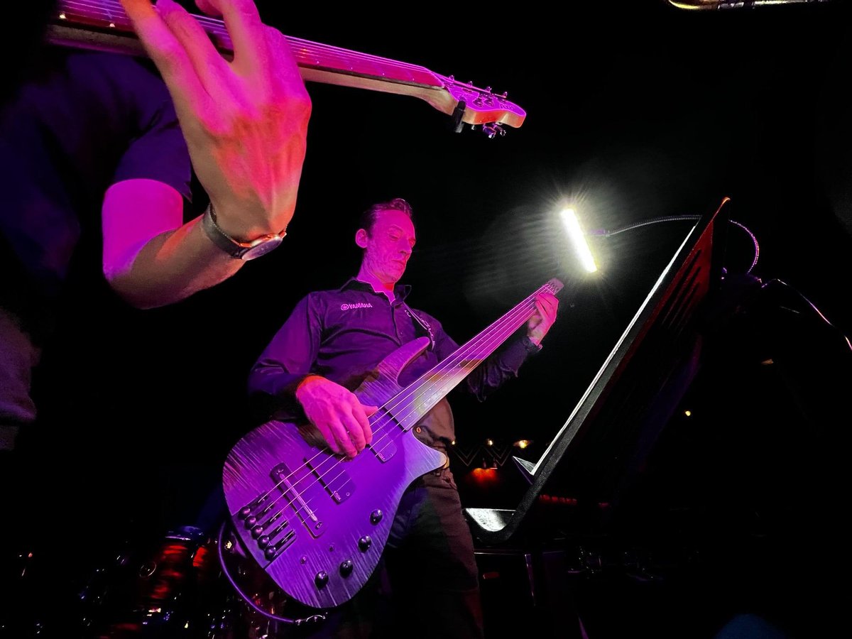 DougGrannell's tweet photo. Somehow I’ve aged 20 years during this gig, but it’s a cool shot creating the illusion the guitarist @Jordy_Rowlands and I were not actually mere centimetres apart. @denmarkstbigbnd https://t.co/bIWrYerXqy