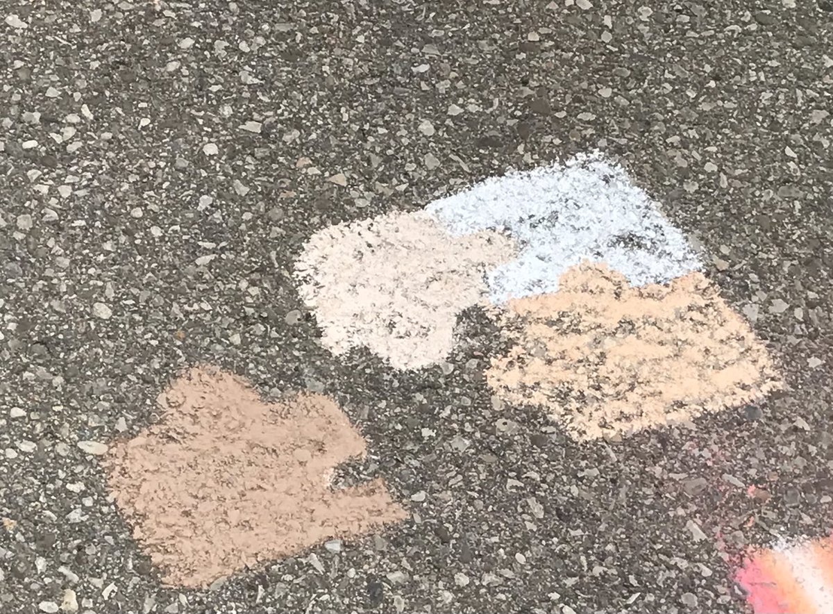 While chalking positive and welcoming messages a student added their favouite <a href="/unlearn_com/">unlearn.</a> image  <a href="/Woodman_Wolves/">Woodman Wolves</a>