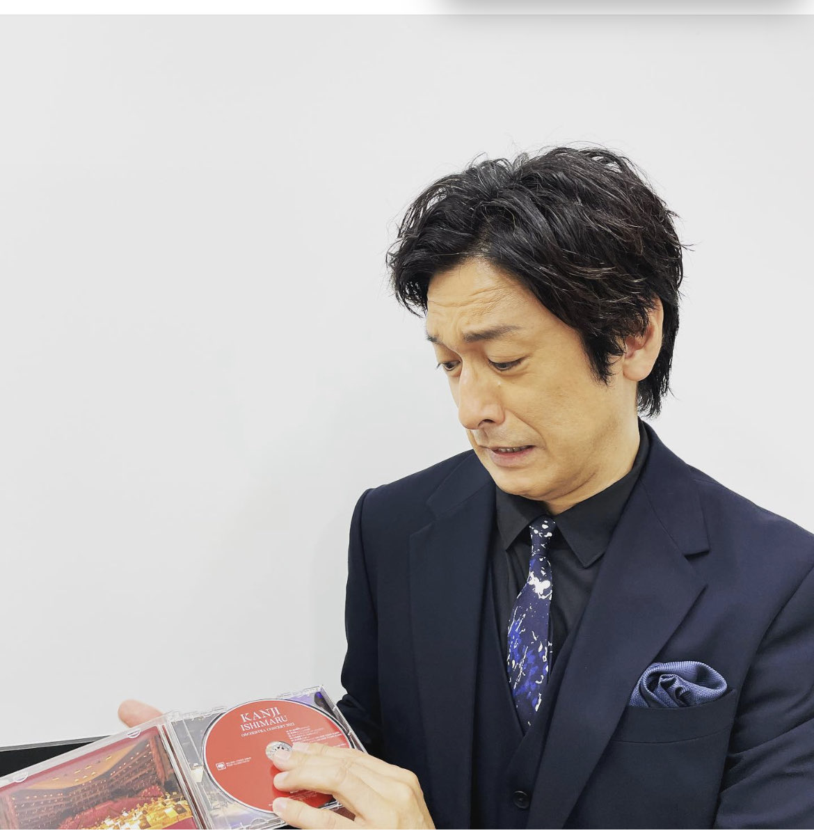 石丸幹二オフショット。円盤がうまく外れず、困った顔のところをパシャ