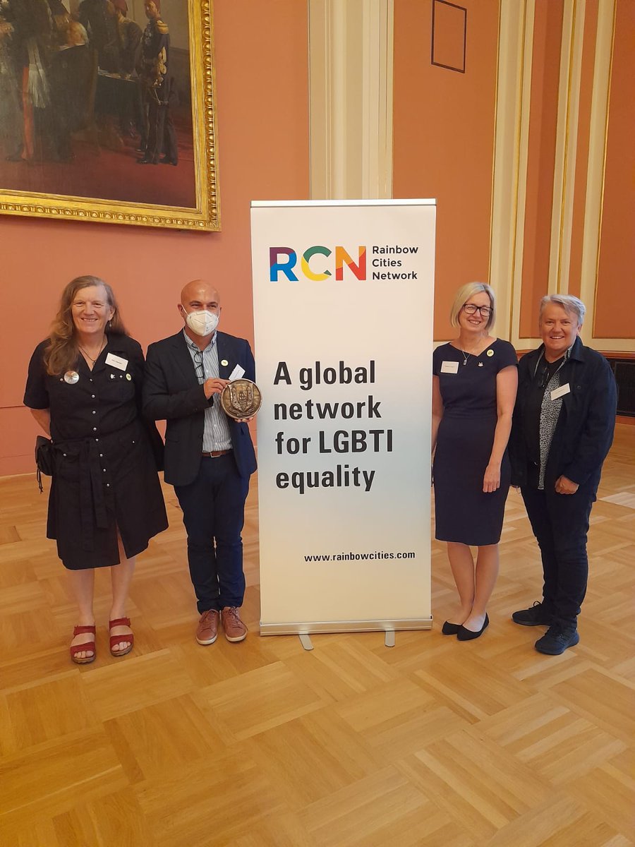 CorkLGBTweek's tweet photo. Proud of our @corkgbtweek @corkcitycouncil representatives at @rainbowcitiesO : #Ailsa @Rebecca_Loughry @katebmoynihan  greeted by #Florencio of host city #Berlin for 2nd European Conference on LGBTI Policy Guidelines. #EuropeForCitizens #LGBTI #RainbowCitiesNetwork 🌈 #Pride2022 https://t.co/WpiYYPOqW2
