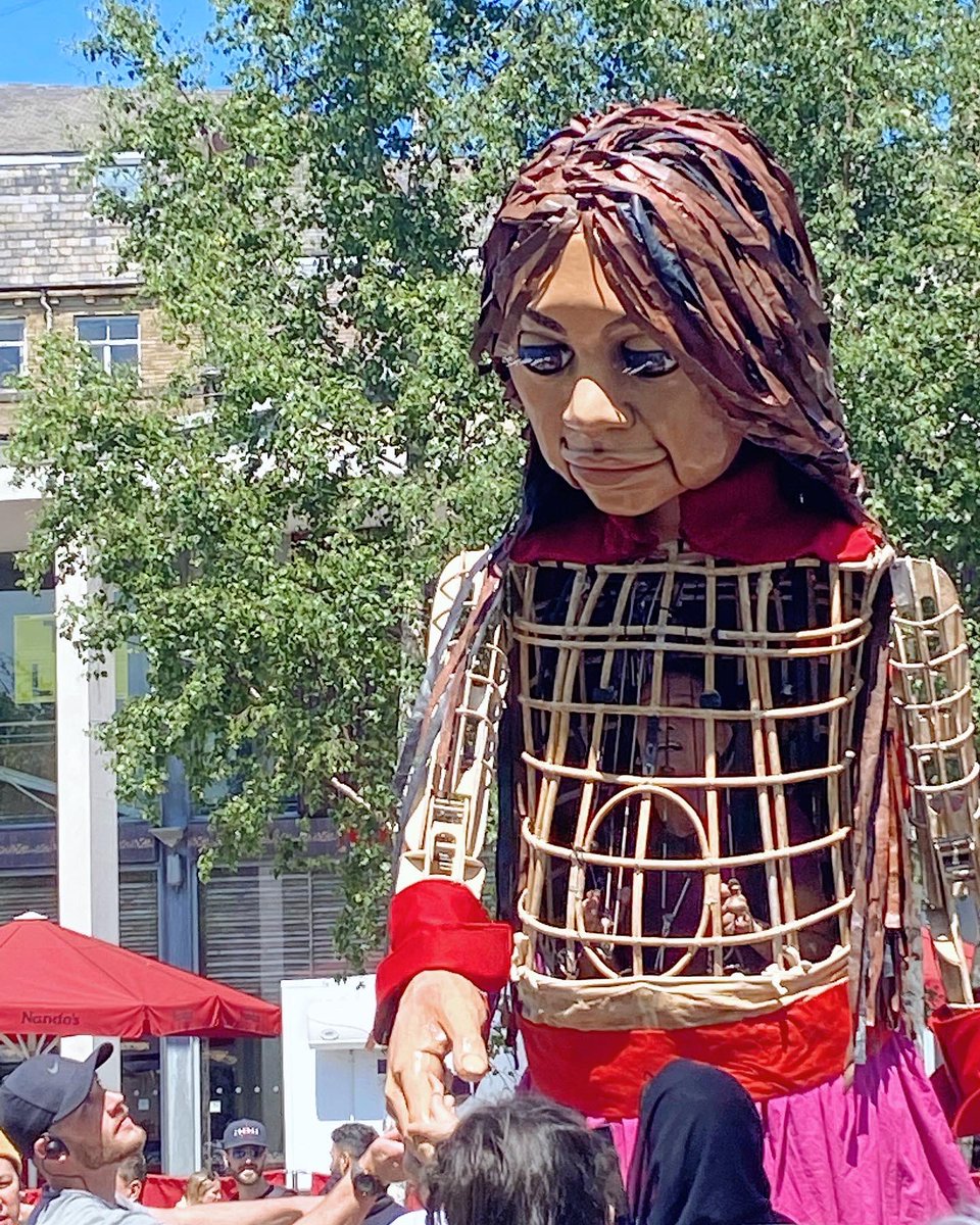 Touchstone3's tweet photo. Wonderful to be able to welcome Little Amal to #Bradford today, on her journey from Syria across Europe, as part of #RefugeeWeek2022. Amazing atmosphere in @CityParkBD as Bradford showed just why it is a City of Welcome and a #CityofSanctuary @walkwithamal @CityofSanctuary https://t.co/VYxzwd8NVi