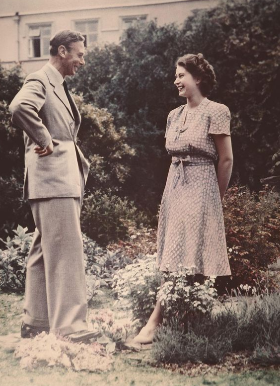The Queen also delved into the Royal Family archives and found a sweet snap of herself aged 20 with her father, King George VI.
