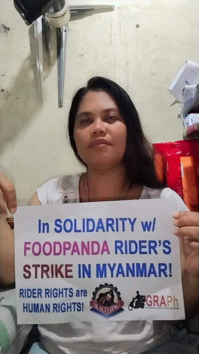 GlobalMayDayNet's tweet photo. Delivery workers organized with the riders' union @kagulong2020 on the Philippines express their support for the ongoing strike at #Foodpanda Myanmar: https://t.co/U2BrTyKdXc

#SolidarityIsOurWeapon 
#DeliveryHeroRidersUnited https://t.co/o64wopVMab