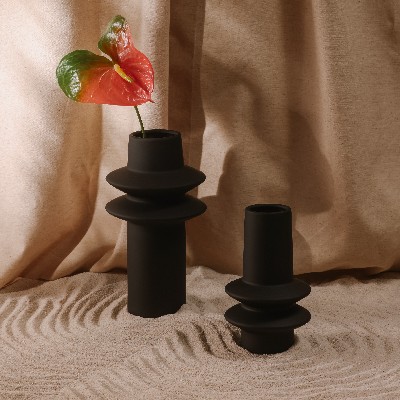 moeshome's tweet photo. The Illustrator vases are a stunning display that gives nod to innovative, structural form &amp; the simplicity of natural materials. Elegant modernity at its finest, this dark-hued amphora inspires minimalism &amp; the ease of adding botanical décor to any space. https://t.co/N5ipCAPyI8